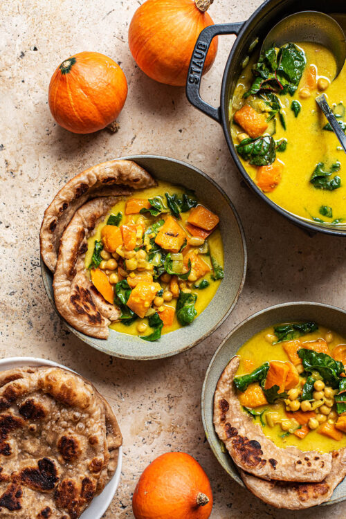 Pumpkin chickpea curry in bowls.
